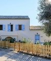 Behind the Blue Shutters: The Story of a Remarkable Corfu Retreat - Quealy & Co